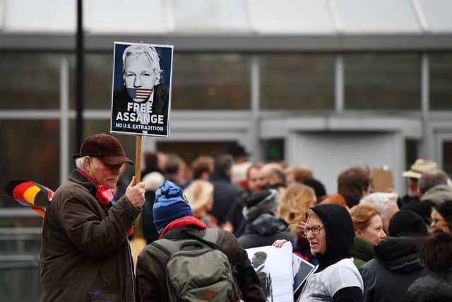 Assange supporters gather outside Woolwich Crown Court.