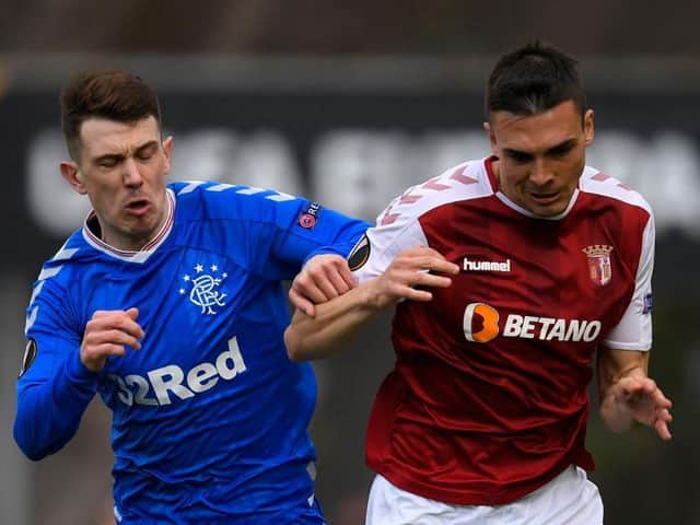 Ryan Jack vies for the ball with Braga's Joao Palhinha