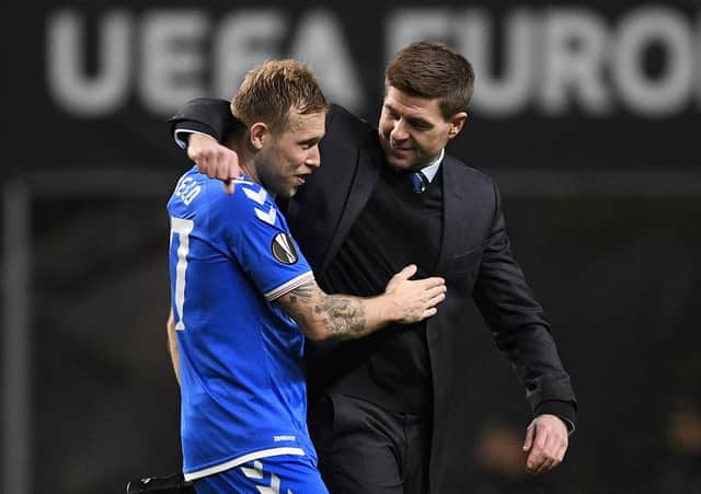 Steven Gerrard celebrates the win in Braga with Scott Arfield. Picture: Octavio Passos/Getty Images