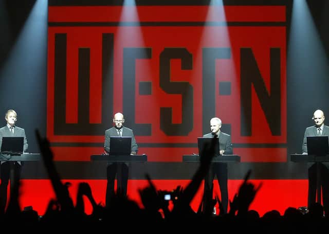 This is either The Scotsman's office on a quiet Tuesday or German band Kraftwerk performing in 2005 (Picture: Robert Atanasovski/AFP/Getty Images)