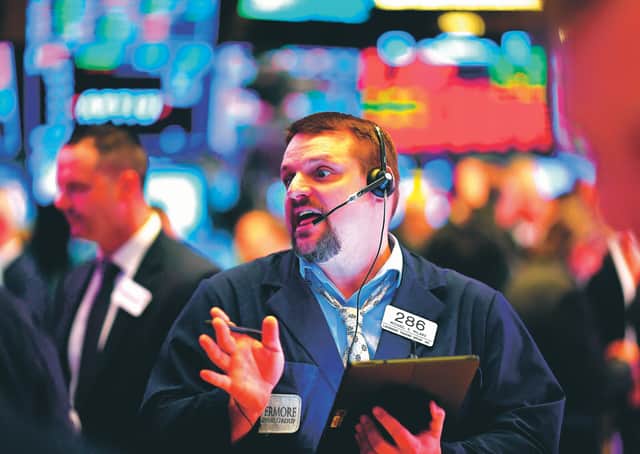 A trader at the opening bell of the New York Stock Exchange. Picture: Johannes Eisele/Getty