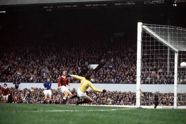 Graham Shaw scores for Hearts past Rangers keeper Peter McCloy in the 1976 Scottish Cup final. Picture: SNS