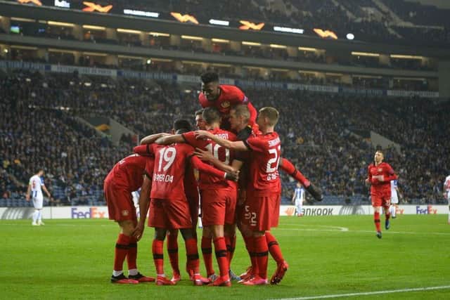 Leverkusen's players celebrate after scoring their third against Porto in the Europa League. Picture: SNS