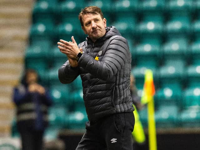 Daniel Stendel applauds the Hearts fans at full time