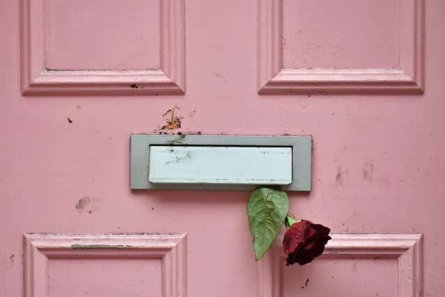 Floral tributes were placed outside Caroline Flack's home in North London