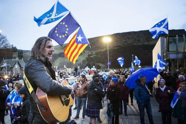 Pro-EU campaigners take part in 'Missing EU Already' rally outside the Scottish Parliament in Edinburgh. Picture: Jane Barlow/PA Wire