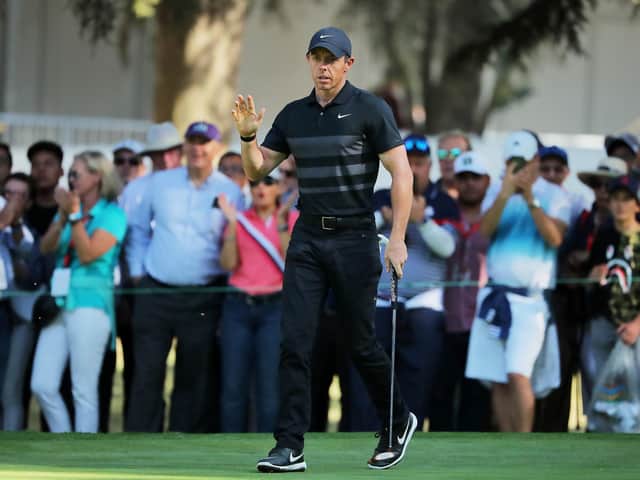 World No 1 Rory McIlroy acknowledges the crowd as he opens with a six-under-par 65 in the WGC-Mexico Championship. Picture: Getty Images