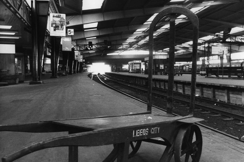 A porter's barrow stands empty on one of the deserted platforms at Leeds Station in March 1976. A limited service of local trains are operating owing to the rail strike. This platform is normally busy with long distance trains.