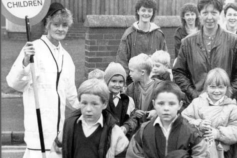 Mrs D. Thorpe, Knottingley lollipop lady and a crowd of children