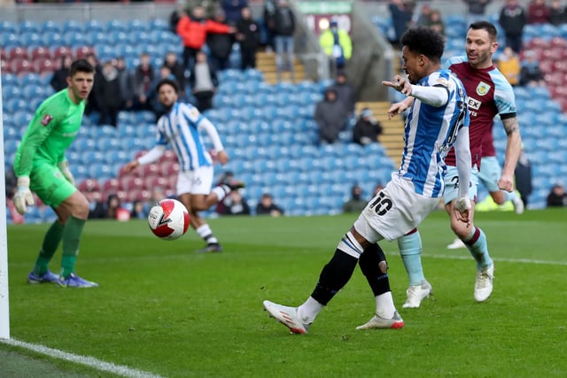 Josh Koroma of Huddersfield Town scores their team's first goal during the Emirates FA Cup Third Round match between Burnley and Huddersfield Town at Turf Moor on January 08, 2022 in Burnley, England.