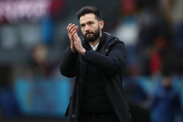 Carlos Corberan, Manager of Huddersfield Town applauds the fans after their sides victory during the Emirates FA Cup Third Round match between Burnley and Huddersfield Town at Turf Moor on January 08, 2022 in Burnley, England.