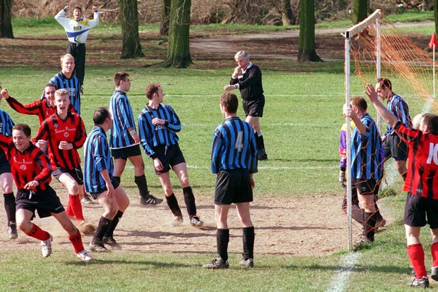 Ian McKenzie, front left of New Wheel celebrates his headed goal from a corner against Elephant and Castle in the Wakefield Express Sunday League Landlords Trophy Round 3.
