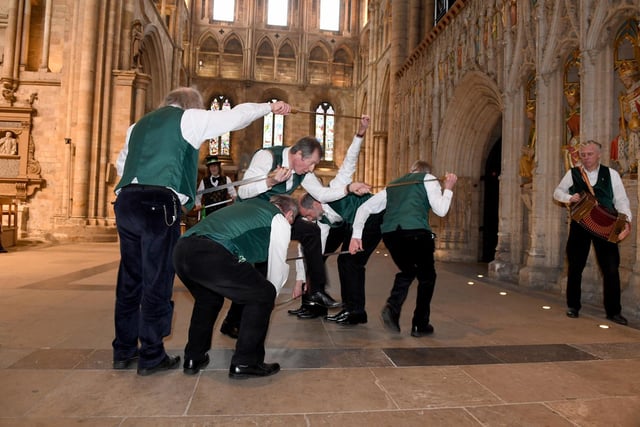 Sword dancers perform before the service