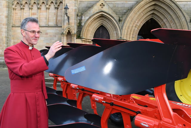 Very Rev'd John Dobson, Dean of Ripon, blessing the plough outside Ripon Cathedral