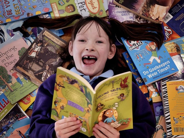 Amelia enjoys a story at Braeburn Junior School in Eastfield.
