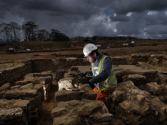 Field Archaeologist Martyn King works on the site of the Roman dig at Eastfield.