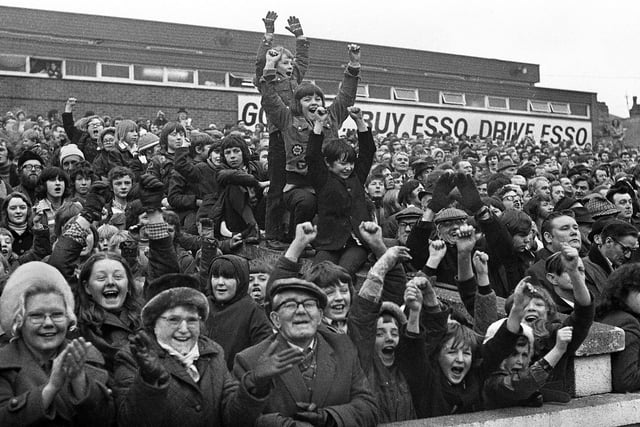 Happy Wigan fans after the Challenge Cup 2nd round match against St. Helens at Central Park on Sunday 18th of February 1973 which Wigan won 15-2.