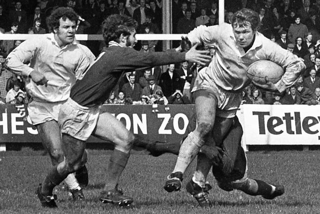 Wigan forward Dave Robinson on the charge against Salford with David Hill backing up in the league match at Central Park on Bank Holiday Monday 3rd of April 1972.
Wigan lost the match 10-13.
