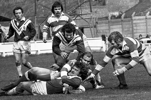 Bill Francis and Colin Clarke try to get their hands on a loose ball against Swinton in the Premiership Trophy 1st round match at Central Park on Saturday 26th of April 1975.
Wigan won 19-17.