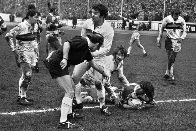 Wigan forward Bill Ashurst crashes over the line and is awarded a try by the referee in the Challenge Cup quarter final match against Bradford Northern at Odsal Stadium on Sunday 4th of March 1973.
Hooker Colin Clarke was sent off for dissent and Wigan lost 11-7.