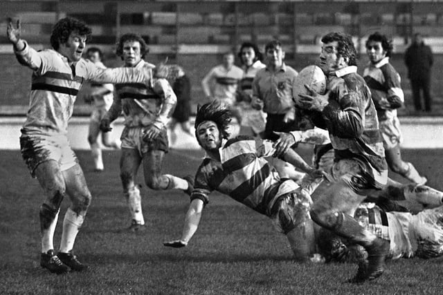 Wigan hooker Colin Clarke collects Bill Ashurst's pass to lead an assault against Bradford Northern in a league match at Central Park on Sunday 14th of January 1973.
Wigan won 32-13.