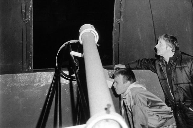The chance to see a spectacular view of the heavens through a powerful telescope was offered to the public by members of the Batley and Spenborough Astronomical Society. Star gazers Mr Charles Cross and Neil Powell, 14, from Dewsbury are pictured with the telescope in the observatory at Wilton Park, Batley.