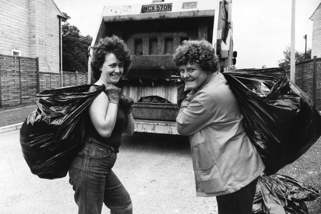 Mrs Ann Taylor, a 32 year old mother of Denby Lane Crescent, Grange Moor, near Dewsbury (left) and Miss Anne Jagger, 34, of Far Dene, Highburton are finding the switch from sweeping streets to carrying plastic sacks a pleasant one.