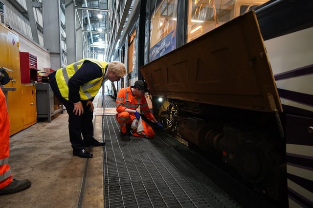 The PM takes a closer look at a tram