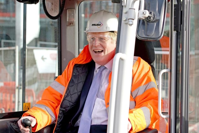The PM in the cab of a construction digger