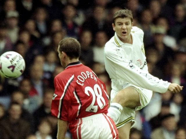Michael Bridges gets in a shot despite heavy pressure from Middlesbrough's Colin Cooper during the Premiership clash at Elland Road in September 1999. Leeds won 2-0.