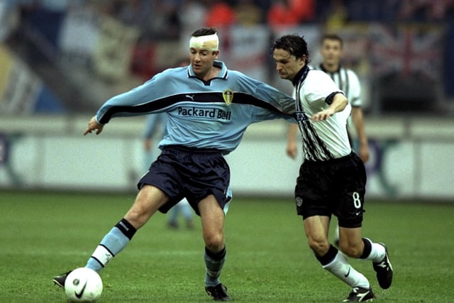 Michael Bridges challenged by Partizan Belgrade's Goran Trobok  during the UEFA Cup first round, first leg clash at the Abe Lenstra Stadium in Heerenveen in September 1999. Leeds won 3-1.