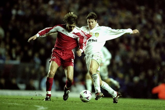 Michael Bridges battles with Spartak Moscow's Ergeni Bouschmanov during the UEFA Cup third round second leg clash at Elland Road. The game finished in a 1-0 win for Leeds and saw them progress to the next round via the away goals route.
