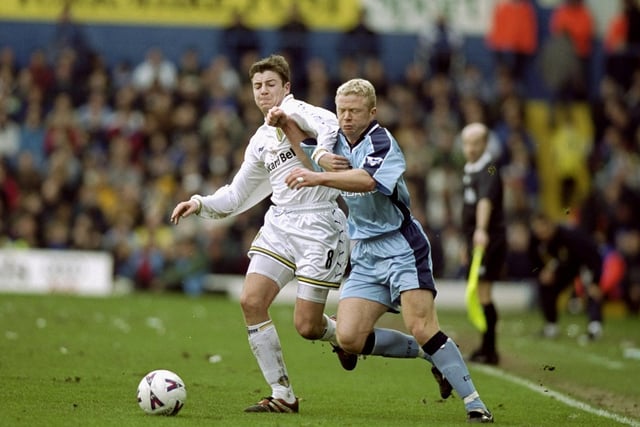 Michael Bridges holds off Coventry City's David Burrows during the Premiership clash at Elland Road in March 2000. Leeds won 3-0.
