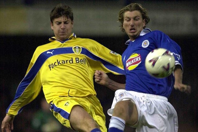 Michael Bridges and Leicester City's Robbie Savage both go for the ball during the Worthington Cup fourth round clash at Filbert Street in December 1999.