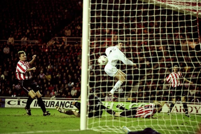 Michael Bridges scores Leeds United's second goal past Sunderland's Thomas Sorensen during the Premier League clash at the Stadium of Light in January 2000. Leeds won 2-1 to stay top of the league.