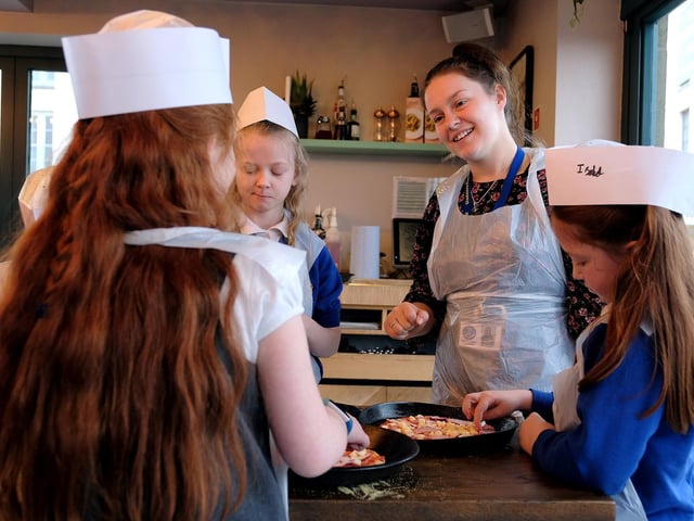 Mrs Connor teaching the children