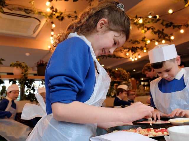 Enjoying making healthy pizzas