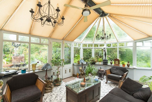 The conservatory is a sun trap and looks out over the beautiful gardens
