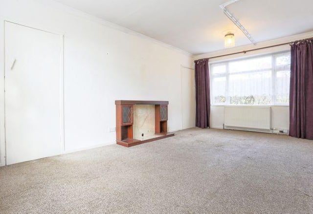 The living room is a fantastic size with plenty of potential.