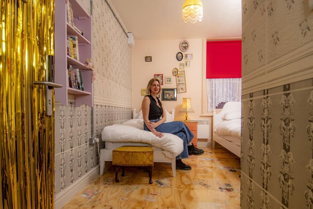 Artist Emma Bentley-Fox in the room she created at the new Art Hostel