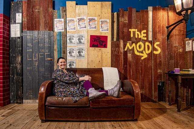 Leeds Art Hostel manager Rhian Aitken in the room created by Mary and Jiem, It's Up To You. This creative duo used inspiration from Leeds' long history of protest movements to create a spectacular room that pays tribute to the radical ideas that have shaped the city's unique identity