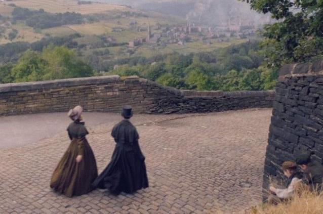The Lister sisters were heading in the wrong direction as they walked from Shibden into Halifax. The road to town was actually filmed on Wakefield Gate heading out of Halifax close to Wainhouse Tower.