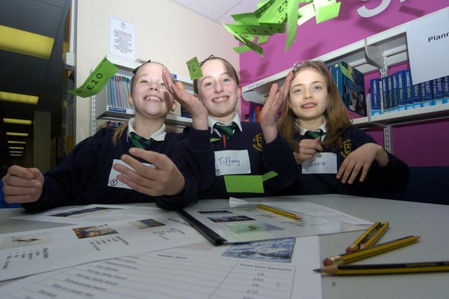 Local schools attend a maths fair at Yorkshire Coast College. Pictured, left to right, Ruth Cook, Tiffany Harrison and Jessica Wilson take part in a holiday booking maths challenge.