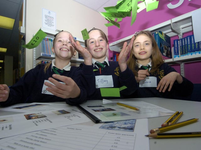 Local schools attend a maths fair at Yorkshire Coast College. Pictured, left to right, Ruth Cook, Tiffany Harrison and Jessica Wilson take part in a holiday booking maths challenge.