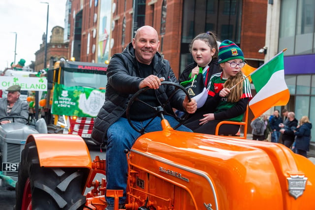 Children piled onto the tractors parked outside Millennium Square as the festivities began.