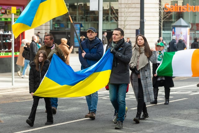 Marchers waved the Ukrainian flag in solidarity with the country now facing a war against Russia.