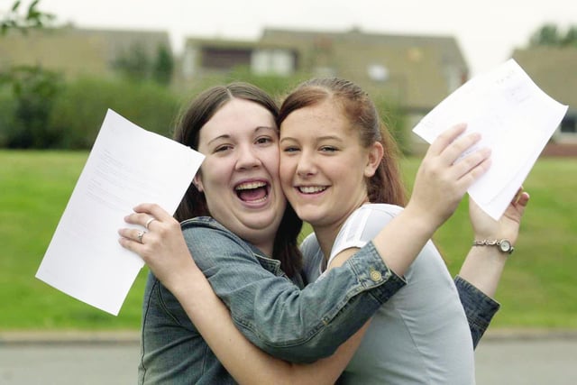 Laura Holmes, left, and Rachel Quayle, both aged 16, after receiving their GCSE results at Earlsheaton High School, 2003.