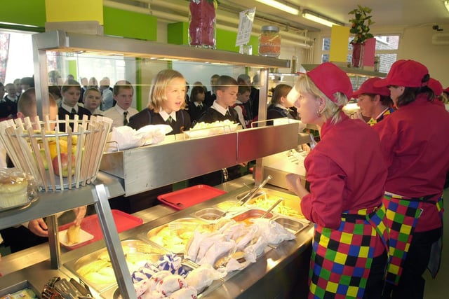 Pupils queue for lunch in the newly designed canteen at Earlsheaton High School, 2001.