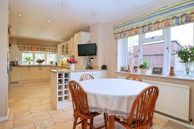 Other features include a wine rack, integrated fridge/freezer and inset ceiling spotlights.