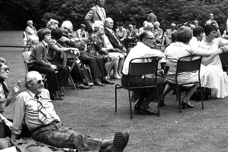 Wigan 's Haigh Hall estate is enjoyed by families in the summer of 1979